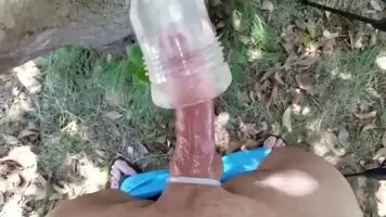 Milking my cock outdoors.
