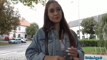 Revealing her tits for money in the street