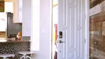 Brooke Sinclaire in a stunning dress and heels