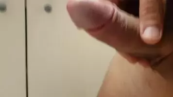 Me leaking in the bathroom of a friend's place. Her cleavage is draining my balls. And I think her husband has noticed it...