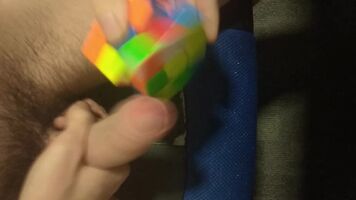 Man solves Rubik's Cube with Penis