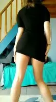Strip dancing in a black thong