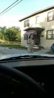 Naked jumping on the hood of the car