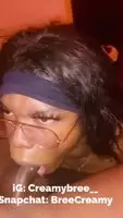 Ebony sissy stares into his soul while slurping his big dick