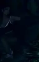 Hanging off of one strap