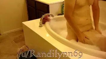 A difficult but fun bathtub fuck, I took a load on my backside