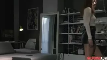 Lesbians on couch have sex with a strap-on and cum from spanking