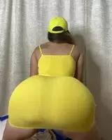Showcasing her big jiggly ass in yellow