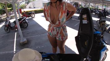 Taking off my top on a parking lot