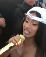 Cardi B and her boobs performing
