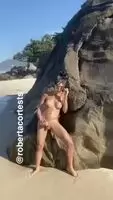 Roberta Cortes naked and stroking on the beach