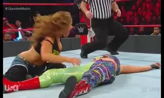 Mickie gropping their oppenents yet again!