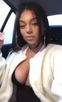 About to fall out of her shirt