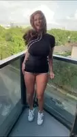 Ava Addams strips nude on the balcony
