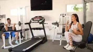 Emily Willis pouring water on white tshirt