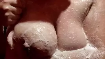 Big Soapy natural pierced titties due for a cleaning!