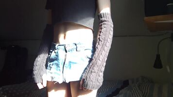 Peeking out of my miniskirt in front of my window ~ it provides the best lighting