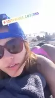 Showing her booty off