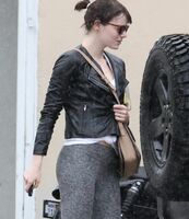 Emma Stone's ass wearing leggins. It's impossible not to jerk off with that ass on display
