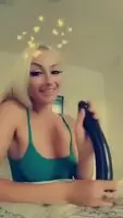 Gorgeous blonde takes a huge black dildo