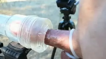 Absolutely love the sun on my body as I milk my swollen cock outdoors.