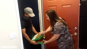 She gets a slice of sausage with her order
