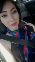Delightful brunette without panties in the car licks her finger and shoves her pussy