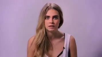 Cara Delevingne playing with her tits, begging you to explode for her.