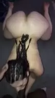 Using her mouth