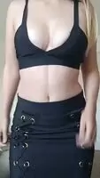 Shaking off her breasts