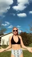 Watching her shake her tits